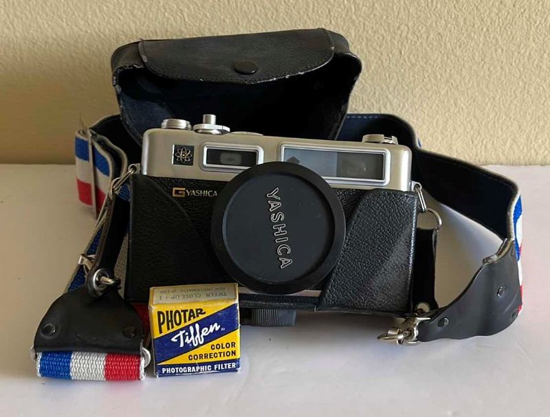 Photo 1 of YASHICA ELECTRO 35 GSN 35mm CAMERA W/CASE AND FILTER