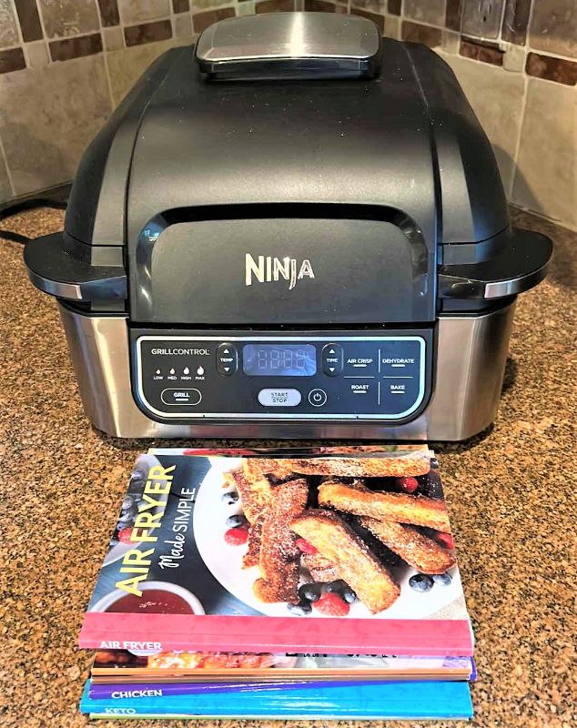 Photo 1 of NINJA  AIRFRYER AND COOKBOOKS