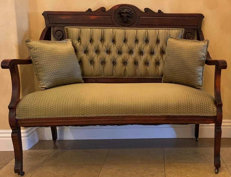 Photo 1 of ANTIQUE CARVED WOOD WITH TUFTED BACK GREEN AND GOLD UPHOLSTERY BENCH ON WHEELS 50” X 23” H40”