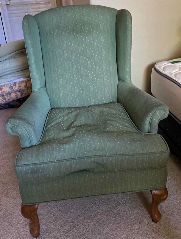 Photo 1 of GREEN UPHOLSTERED WING BACK CHAIR