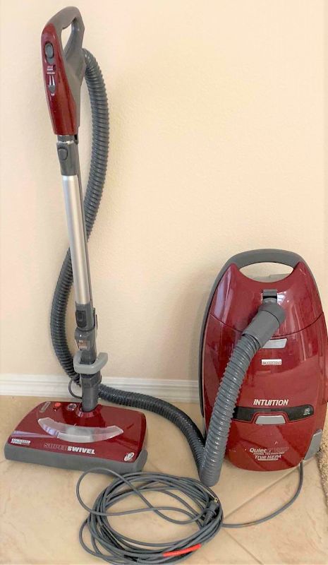 Photo 1 of KENMORE INTUITION CANISTER VACUUM WITH BAGS POWERS ON