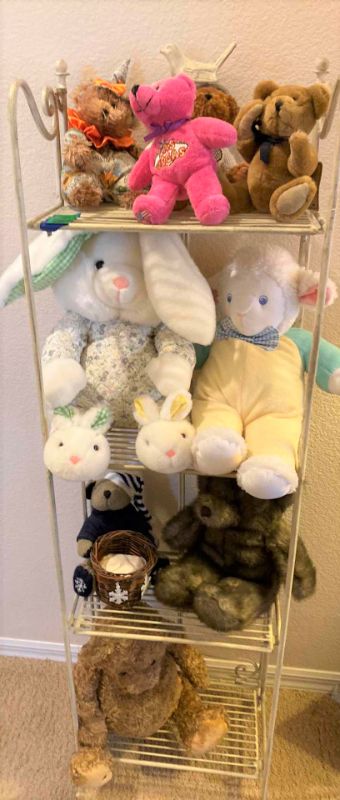 Photo 1 of Four shelf rack with stuffed animals 15“ x 9“ H 52”