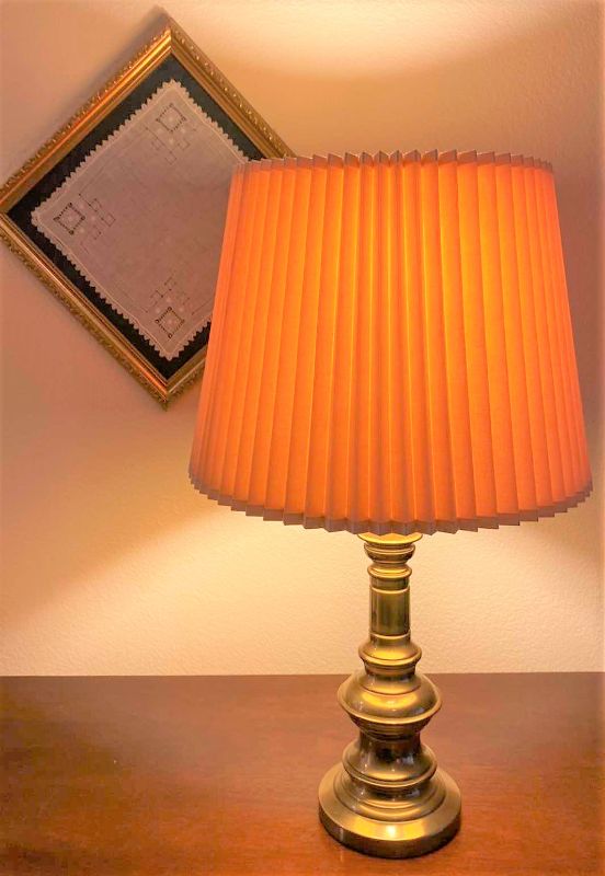 Photo 1 of Brass table lamp H26” and framed napkin 15“ x 15“