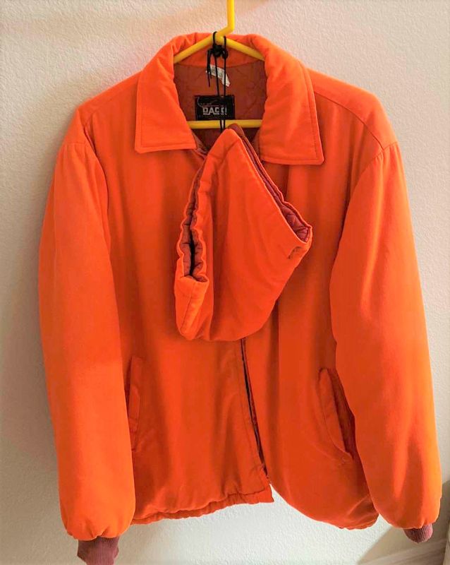 Photo 1 of DACO men’s orange two-piece hunting jacket size unknown, estimated medium