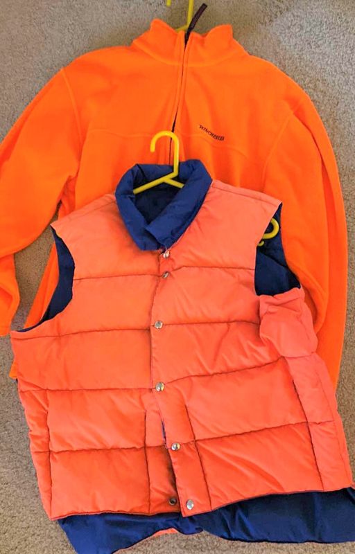 Photo 1 of Men’s size large, Winchester, polar fleece and unknown brand vest.