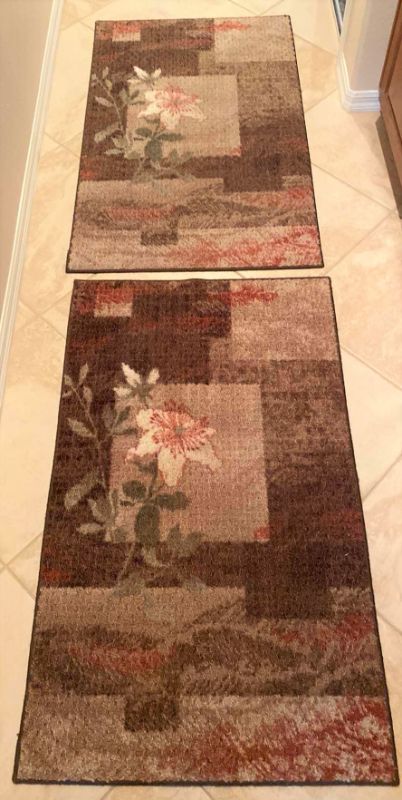 Photo 1 of Pair of floor rugs 50” x 30 1/2“