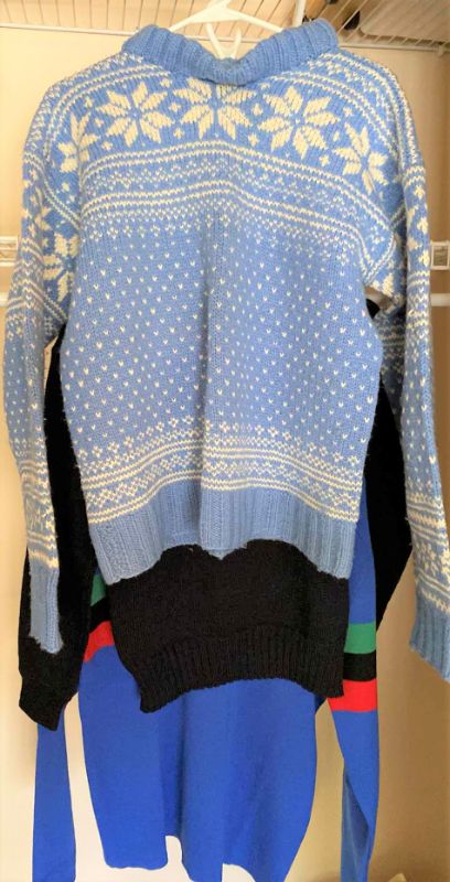 Photo 1 of 3 -  wool sweaters no sizes indicated, estimated one women’s medium and two men’s large