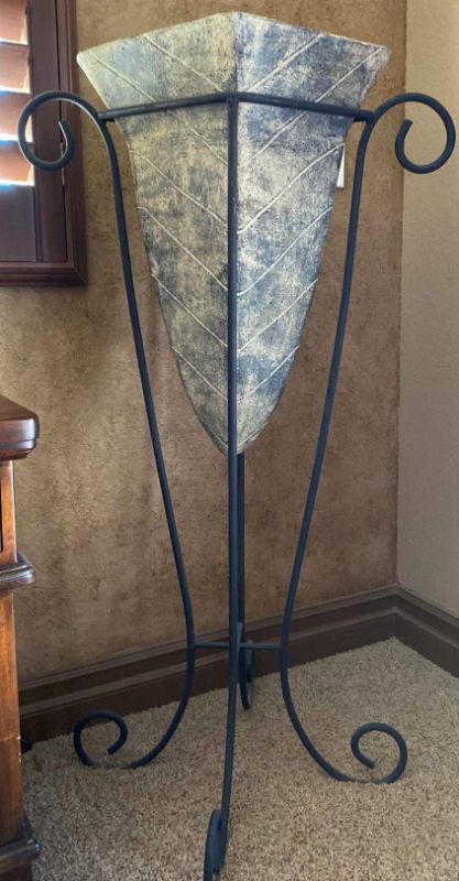 Photo 1 of LARGE POTTERY VASE IN WROUGHT IRON STAND 27” x 47”