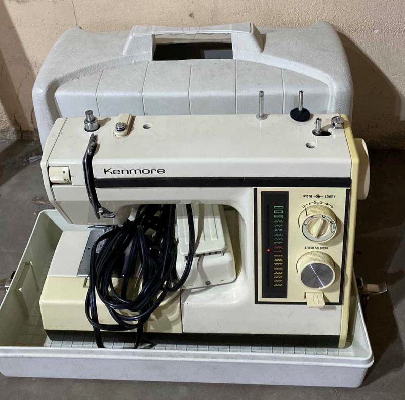 Photo 1 of KENMORE SEWING MACHINE WITH CASE