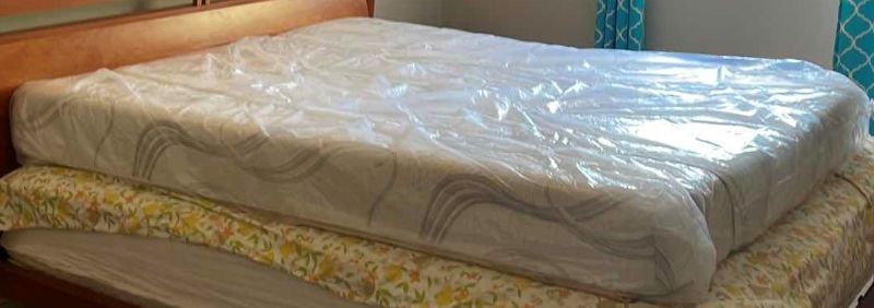 Photo 1 of QUEEN FIRM MATTRESS IN PLASTIC 80x60”