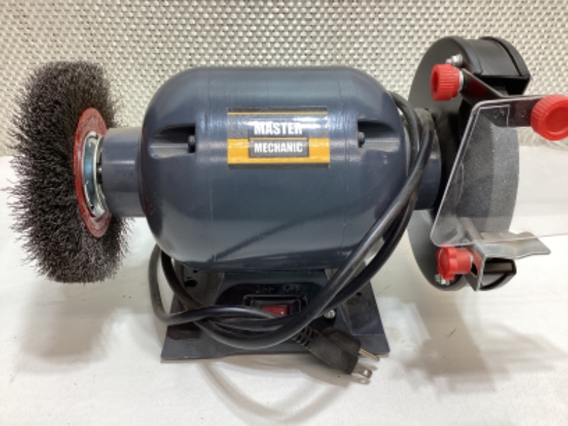 Photo 1 of MASTER MECHANIC BENCH GRINDER 1/2 HORSEPOWER MOTOR 6” WHEEL SIZE