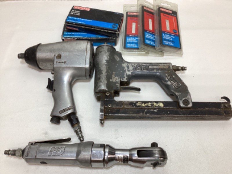 Photo 1 of CAMPBELL HAUSFRLD 1/2” AIR PNEUMATIC IMPACT WRENCH MODEL # TL1002 & 3/8”AIR RATCHET MODEL #PL1501 &  SENCO PNEUMATIC BRAD NAILER GUN MODEL #L W/ 5 BOX OF NAILS