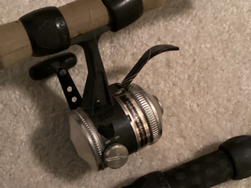 Photo 4 of VINTAGE FISHING POLES AND REEL