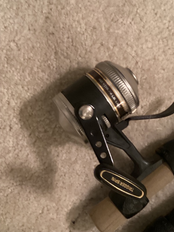 Photo 2 of VINTAGE FISHING POLES AND REEL