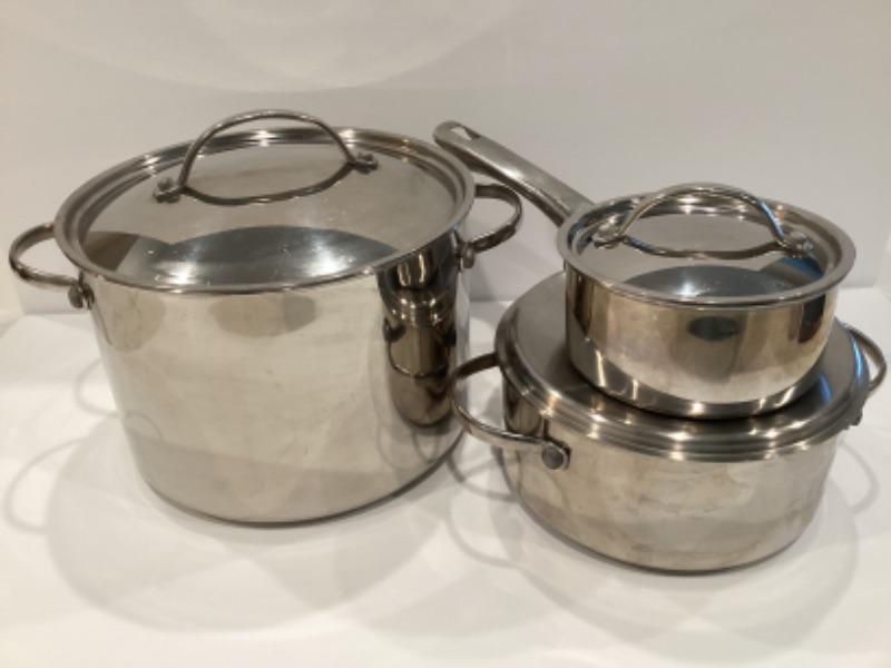 Photo 1 of FABERWARE MILLINIUM STAINLESS STEEL SET OF 3 COOKING SET W/LIDS