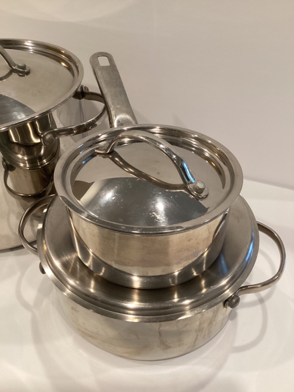 Photo 1 of FABERWARE MILLINIUM STAINLESS STEEL SET OF 3 COOKING SET W/LIDS