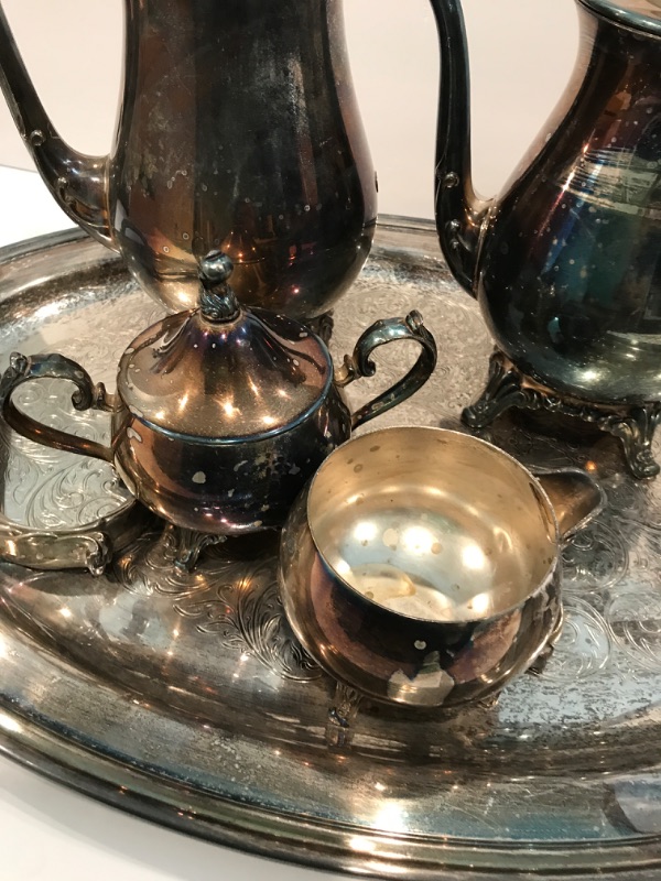 Photo 3 of VINTAGE SILVER PLATE COFFEE/TEA SET WITH PLATER 
NEEDS TLC 