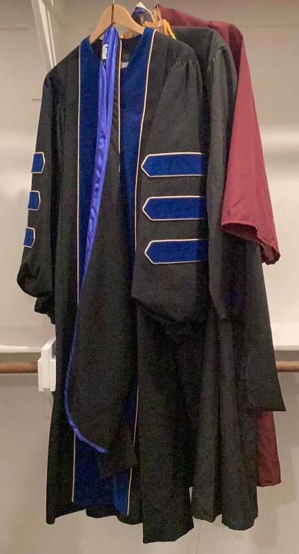 Photo 1 of GRADUATION GOWNS WITH TASSELS. INCLUDING BRANDS FROM BALFOUR AND JOSTENS, SIZE 5’7” - 5’9”. ALL IN GREAT CONDITION.