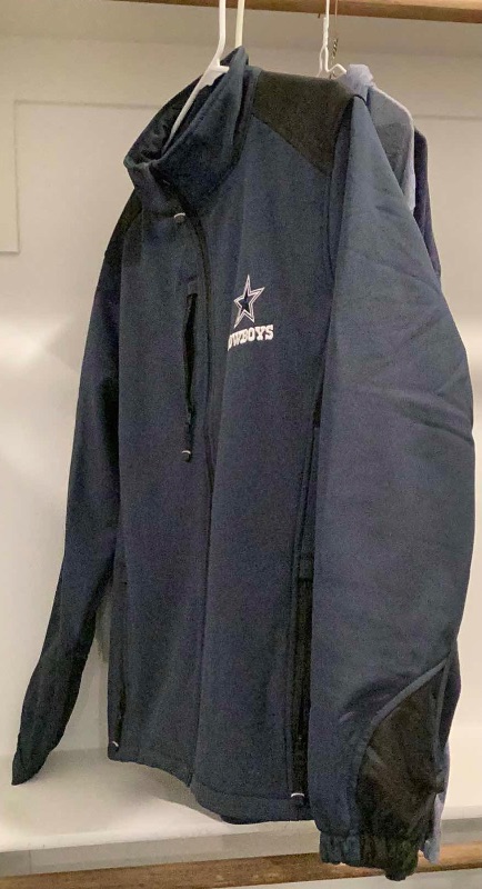 Photo 1 of DALLAS COWBOY JACKET AND COLLECTION OF MERCHANDISE 4 PAIR SIZES FROM M TO XL.