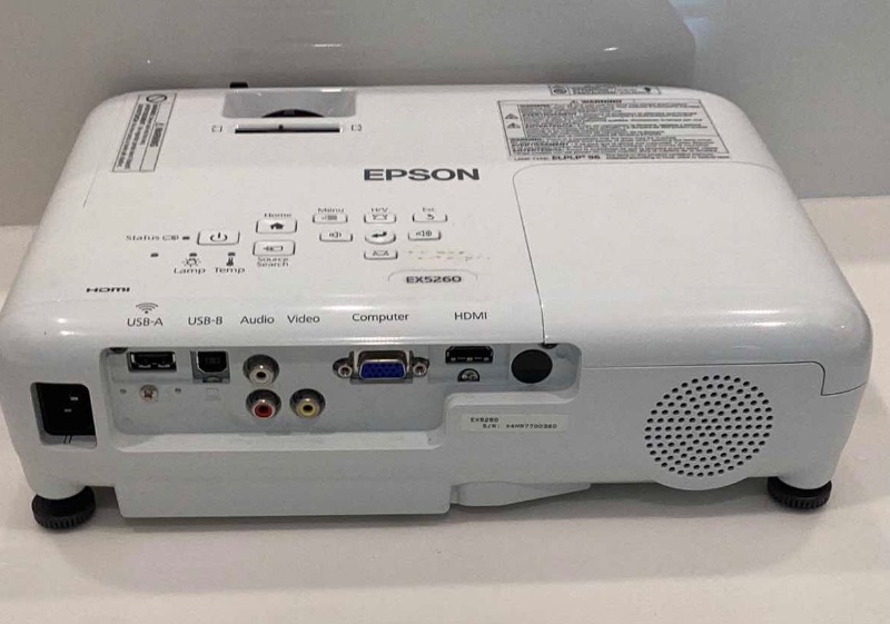 Photo 4 of EPSON LCD PROJECTOR INCLUDES POWER CORD, REMOTE, INSTRUCTIONS, AND BATTERIES FOR REMOTE.