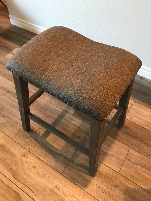 Photo 2 of 2 HOME-ROOTS HEIGHT SADDLE STYLE COUNTER STOOL W/ NAIL HEAD TRIM 19”x15”x23” - MORE IN AUCTION