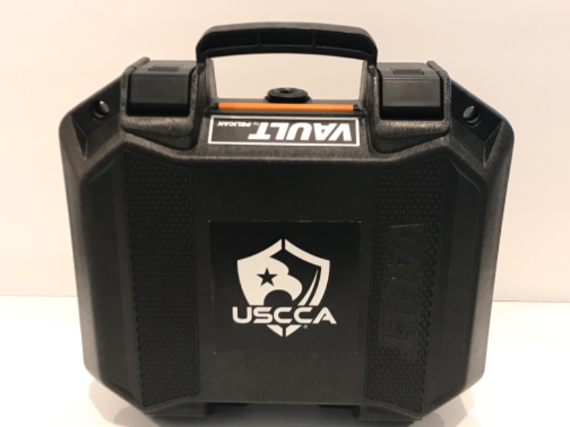 Photo 1 of VAULT BY PELICAN GUN CARING CASE & GUN HOLSTER