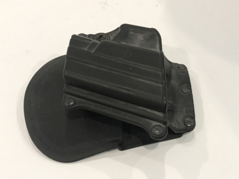 Photo 1 of VAULT BY PELICAN GUN CARING CASE & GUN HOLSTER