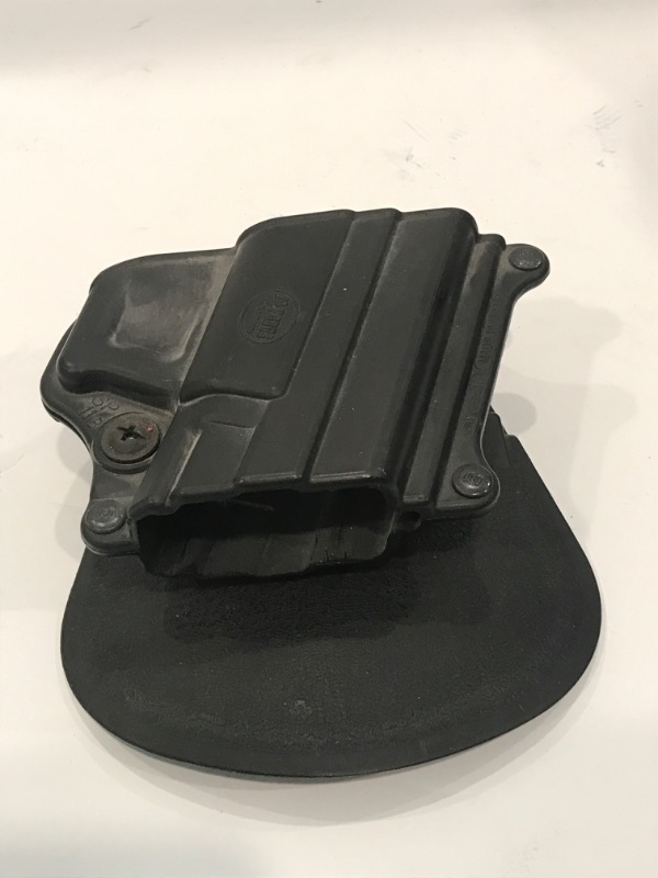 Photo 1 of VAULT BY PELICAN GUN CARING CASE & GUN HOLSTER