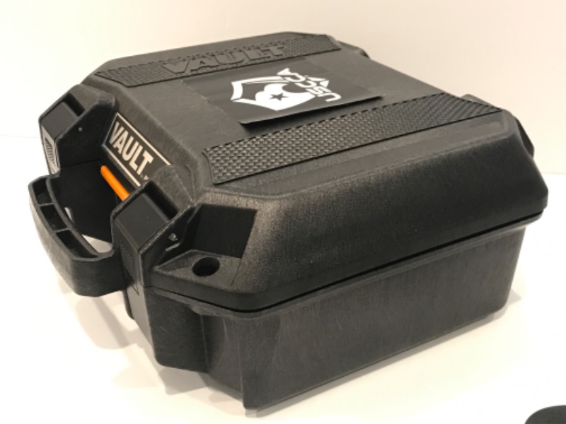 Photo 1 of VAULT BY PELICAN GUN CARING CASE & GUN HOLSTER
