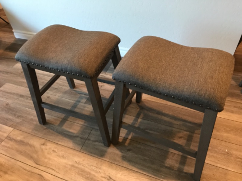 Photo 1 of 2 HOME-ROOTS HEIGHT SADDLE STYLE COUNTER STOOLS W/ NAIL HEAD TRIM 19”x15”x23” - MORE IN AUCTION