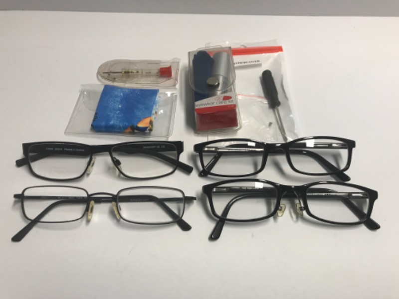 Photo 1 of MENS GLASS FRAMES AND READING GLASSES W / SUPPLIES