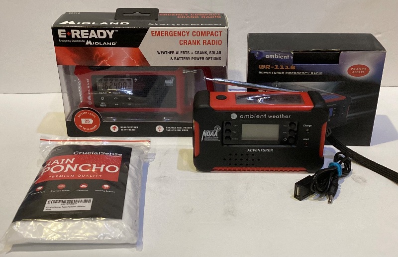 Photo 1 of E READY EMERGENCY COMPACT CRANK RADIO / PONCHO AND MORE