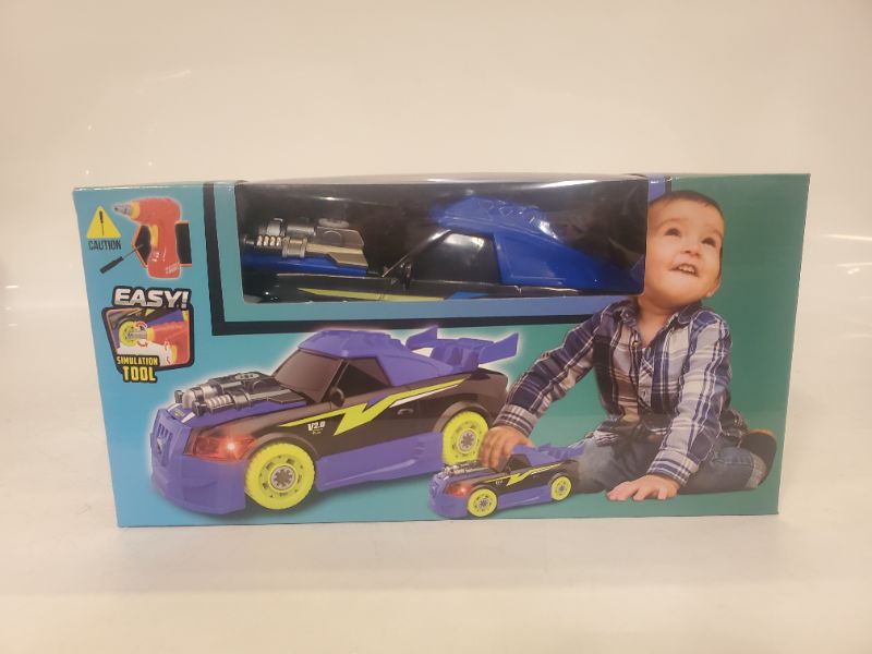 Photo 1 of CAR MODIFICATION KIT BLUE RACE CAR INCLUDES TOOLS TO PUT TOGETHER 