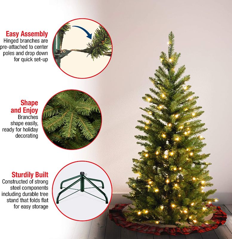 Photo 2 of National Tree Company Artificial Pre-Lit Slim Christmas Tree, Green, Kingswood Fir, White Lights, Includes Stand, 4.5 Feet  -ITEM # KW7-300-45