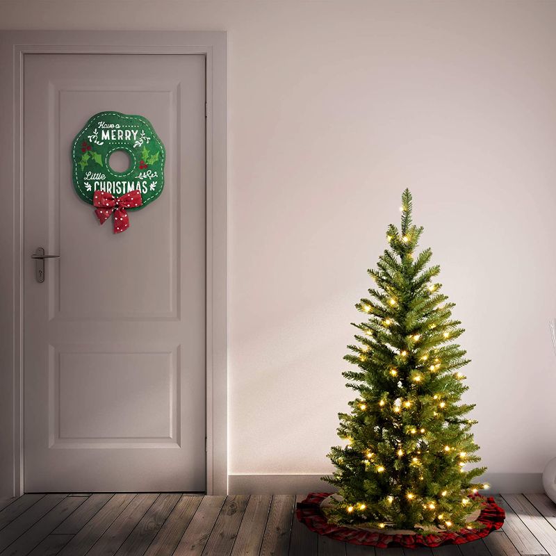 Photo 3 of National Tree Company Artificial Pre-Lit Slim Christmas Tree, Green, Kingswood Fir, White Lights, Includes Stand, 4.5 Feet  -ITEM # KW7-300-45