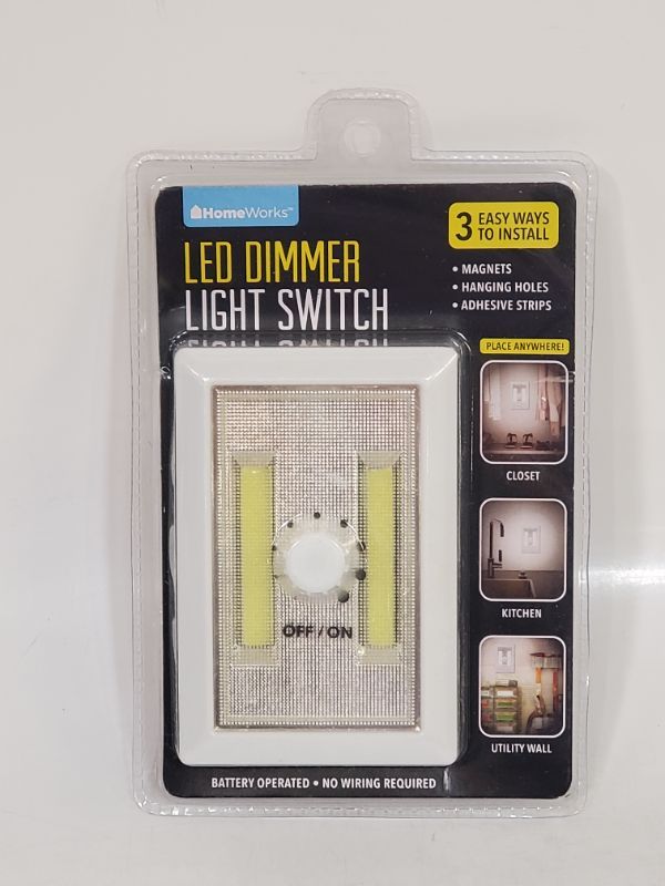 Photo 2 of LED DIMMER LIGHT SWITCH - 3 WAYS TO INSTALL, MAGNETS, HANGING HOLES, & ADHESIVE STRIPS - BATTERY OPERATED NO WIRING REQUIRED- WHITE 