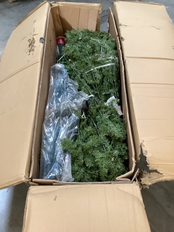 Photo 1 of National Tree Company Pre-Lit Artificial Full Christmas Tree, Green, 12 Feet 