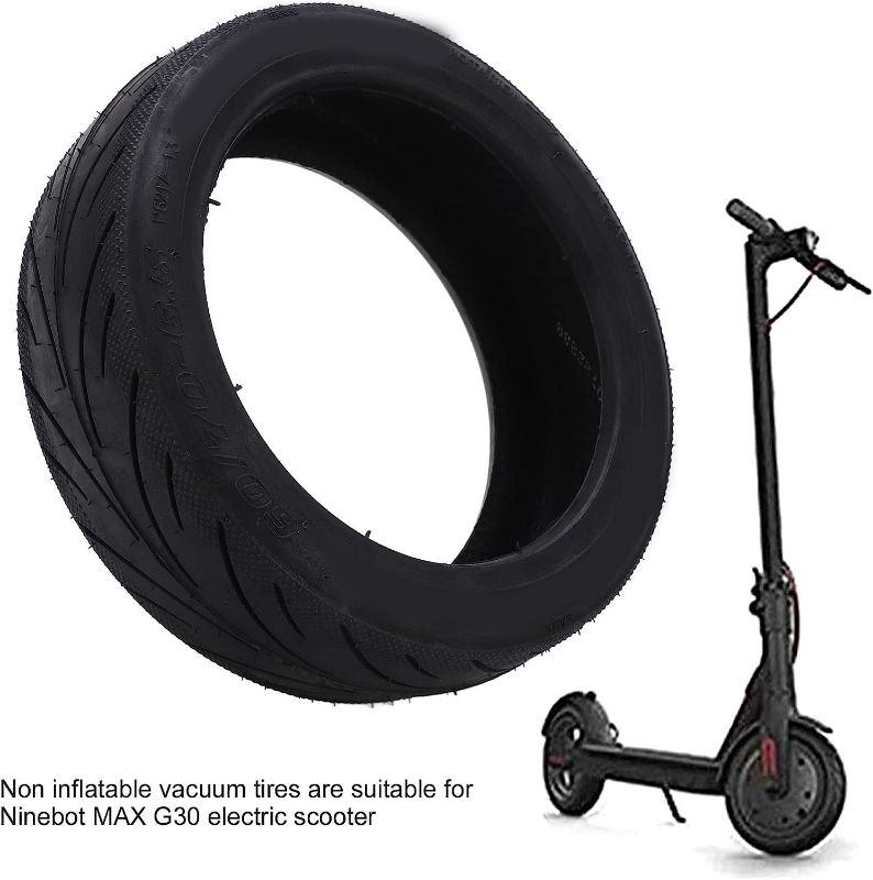 Photo 1 of Electric Scooter Rubber Tires, 60/70?6.5 Electric Scooter Vacuum Outer Tires Stable Structure Electric Scooter Non Pneumatic Tires Electric Car Scooter Supplies 60/70-6.5 Scooter Tire
