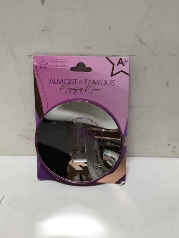 Photo 2 of ALMOST FAMOUS 15x Magnifying Mirror with Suction Cup Backing, Compact and Travel Ready for Makeup Application, Tweezing, and Blackhead Removal - Purple