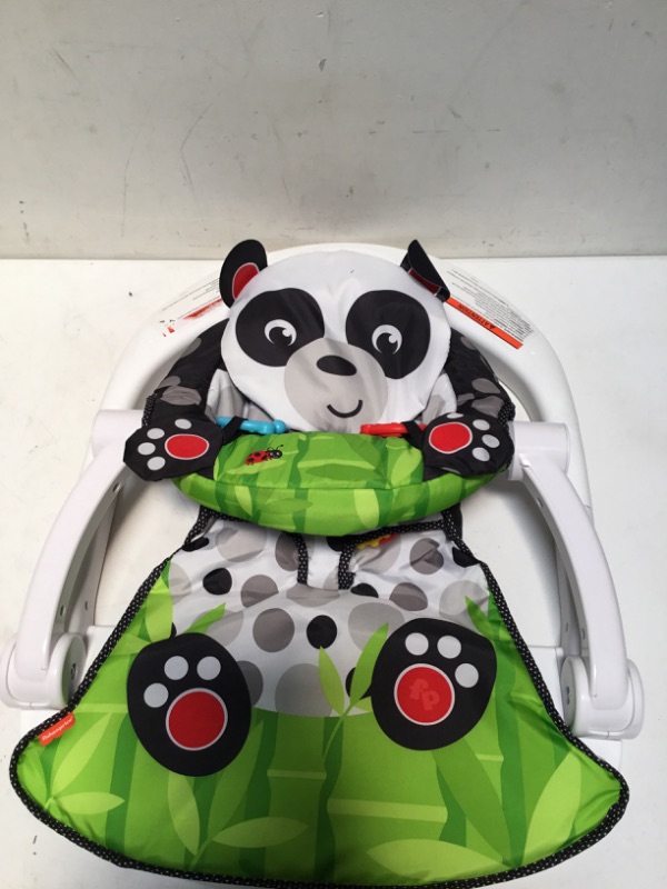 Photo 2 of Fisher-Price Portable Baby Chair Sit-Me-Up Floor Seat with Developmental Toys and Crinkle & Squeaker Seat Pad, Panda Paws
