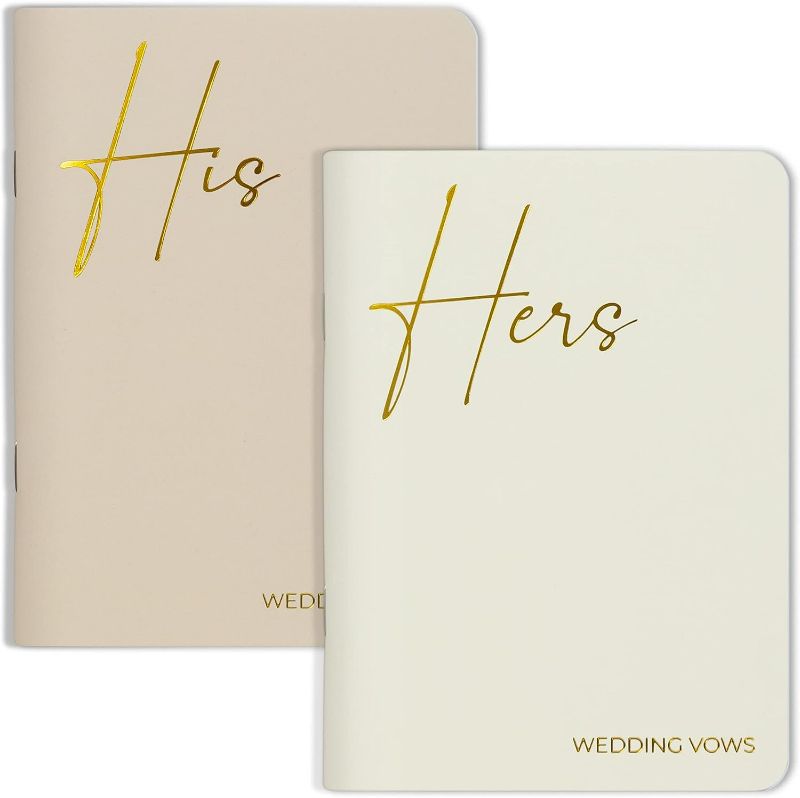 Photo 1 of Elegant Vow Books With Gold Foil Lettering For Your Wedding - Perfectly Sized His and Hers Vow Books With Plenty Of Pages To Write Whatever is on Your Heart - A Beautiful Addition For The Wedding Day
