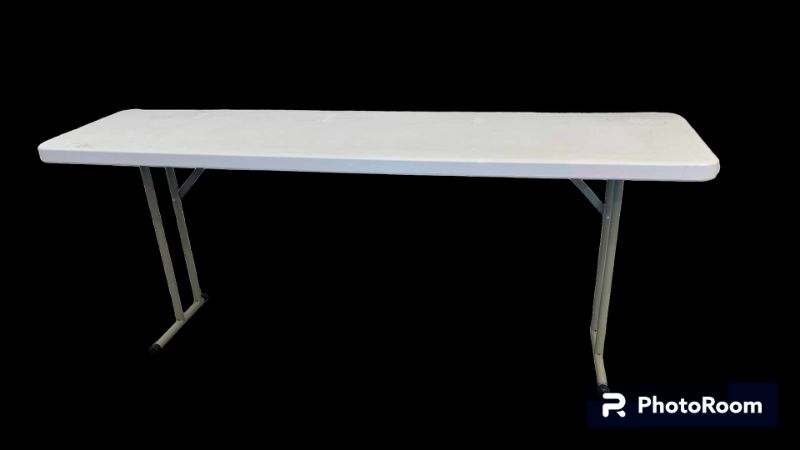 Photo 1 of METAL BASE W PLASTIC TOP FOLDING TABLE 71” X 18” H29”