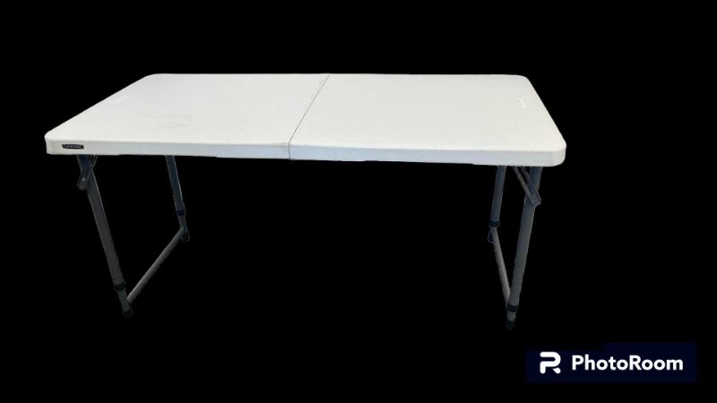 Photo 1 of LIFETIME METAL BASE W PLASTIC TOP FOLDING TABLE 48” X 24” H22”