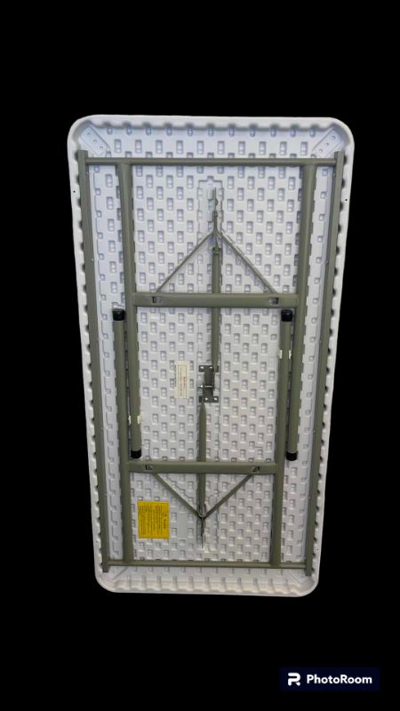 Photo 1 of METAL BASE W PLASTIC TOP FOLDING TABLE 48” X 24” H29”
