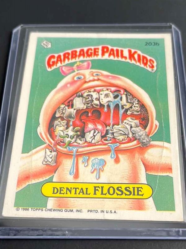 Photo 1 of 1988 GARBAGE PAIL KIDS DENTAL FLOSSIE TOPPS CARD 203B