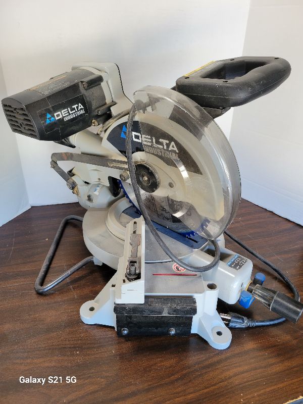Photo 1 of DELTA MODEL 36-58 10" DUAL BEVEL MITER SAW