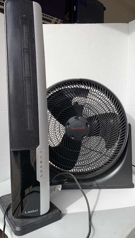 Photo 1 of HONEYWELL 20 INCH FAN AND LASKO SPACE HEATER WITH REMOTE