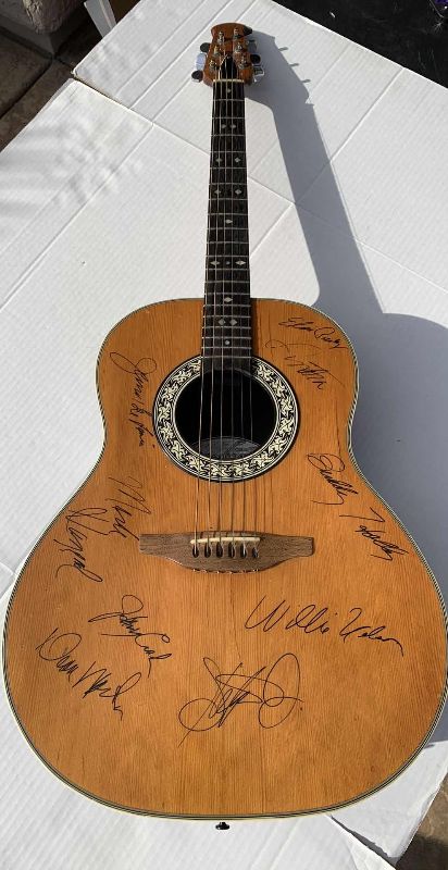 Photo 1 of OVATION ACOUSTIC GUITAR MODEL 1112-4 AUTOGRAPHS UNAUTHENTICATED