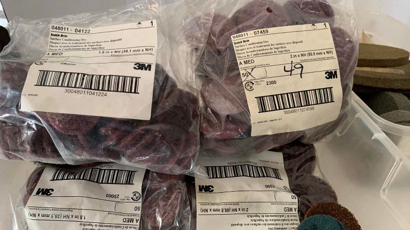 Photo 1 of 2 CONTAINERS OF GRINDING SUPPLIES