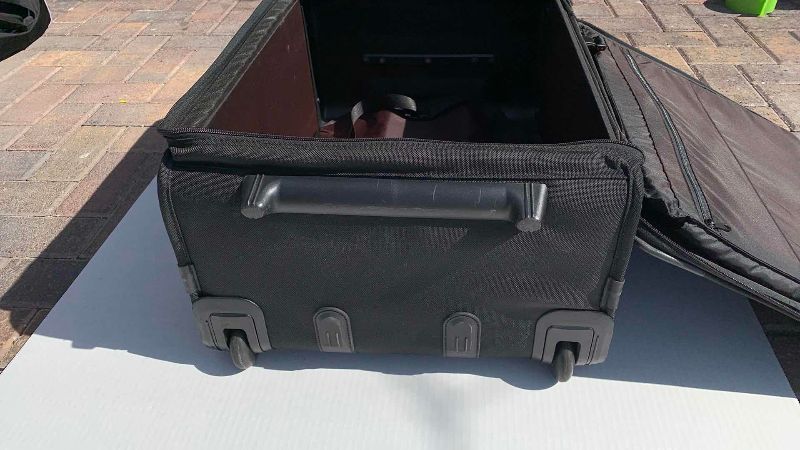 Photo 3 of LARGE TUMI SUITCASE